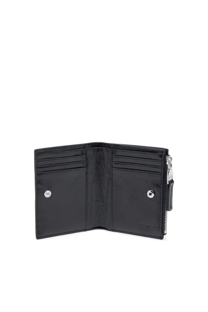 bi-fold zip ii Lederbrieftasche mit geprägtem Kettenmotiv